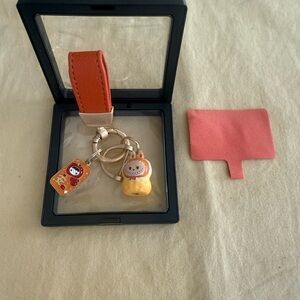 Orange and Gold Keychain with Charms